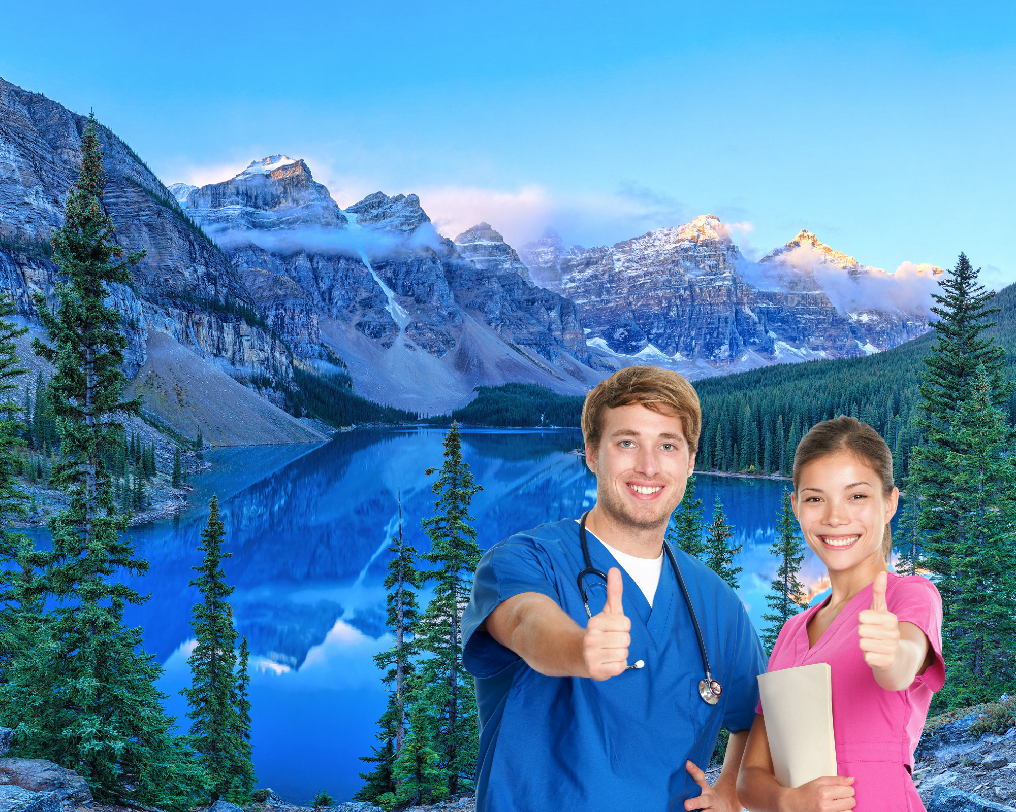 Two happy nurses giving a thumbs up with a backdrop of Lake Louise behind them 